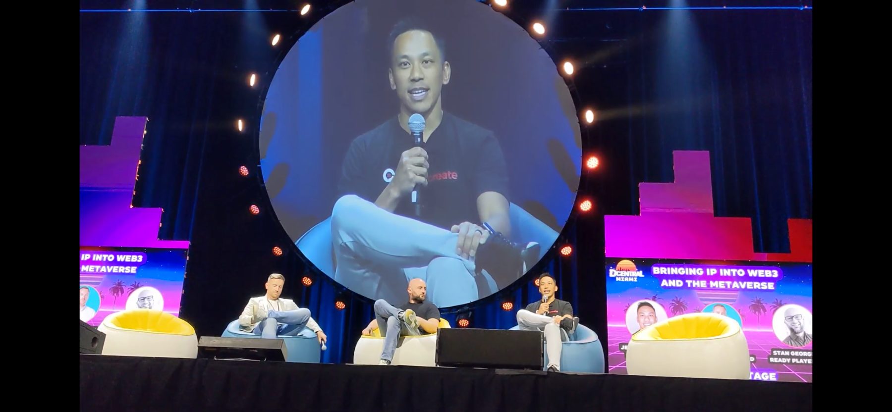 Crowdcreate speaking on stage at a conference